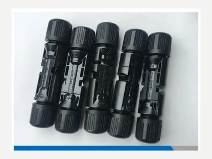 Black photovoltaic cable connectors shown in the product manual